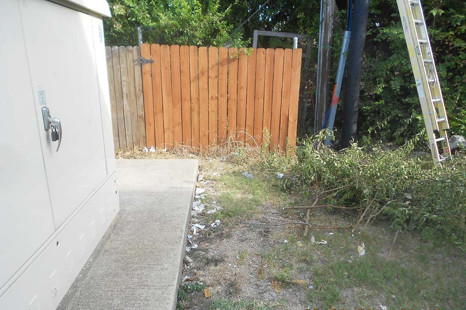 Image of a a partially constructed/incomplete fence.
