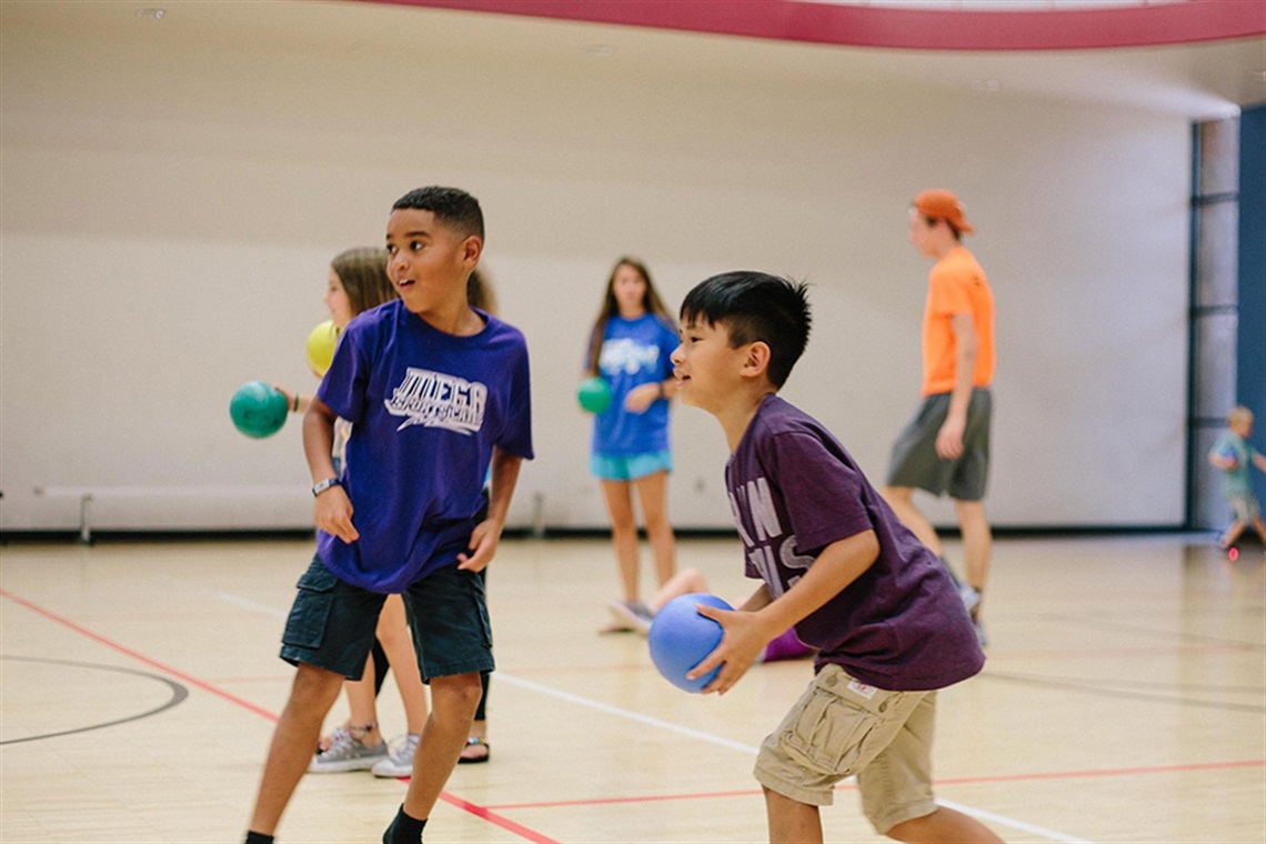 Children playing ball at Elzie Odom Athletic Center