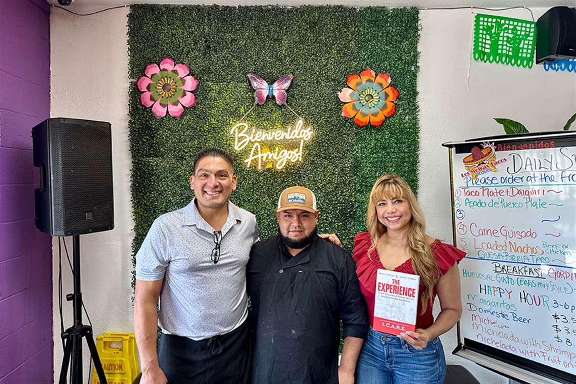 Owners of small business, Las Molcas posing and smiling