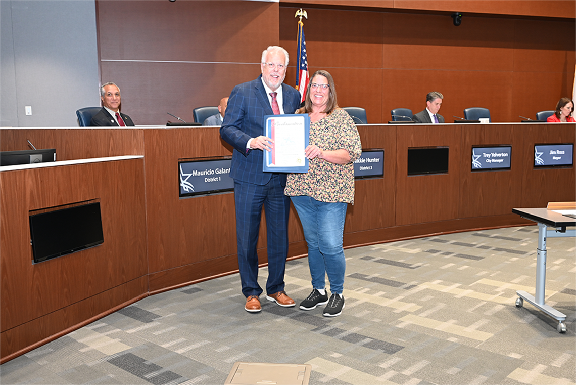 Mayor Ross and Stormwater manager in Council Chambers