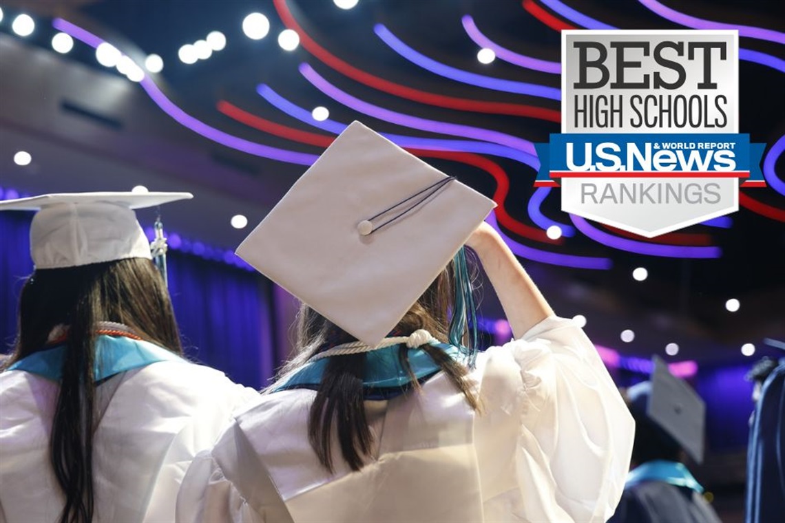 A graduation wearing a white cap and gown with a title Best High Schools U.S. News and World Report