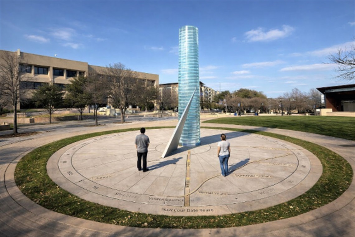 Rendering of glass column with two people standing by it.
