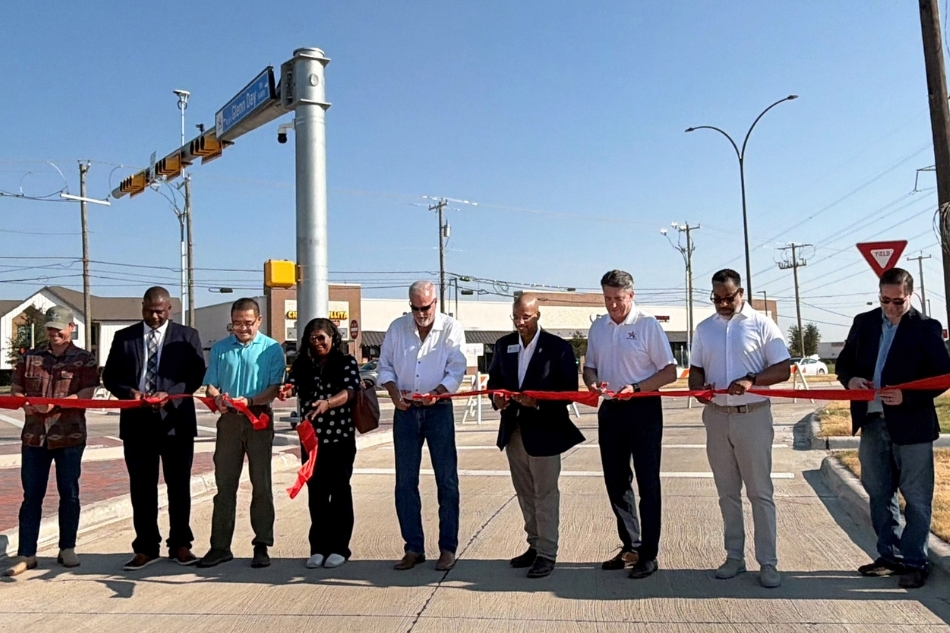 City and county leaders celebrate the opening of the Debbie Lane widening project on Aug. 28, 2026