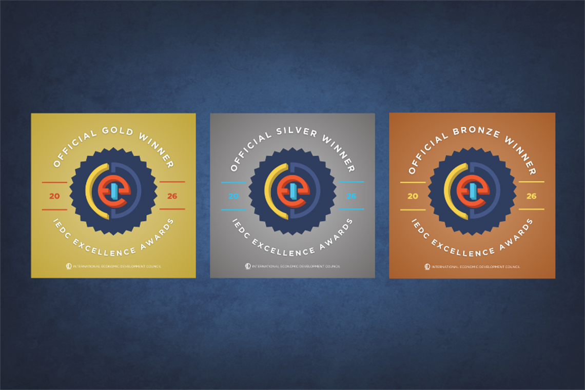 Blue background with three badges, saying IEDC Awards 2026 in Gold, Silver, and Bronze