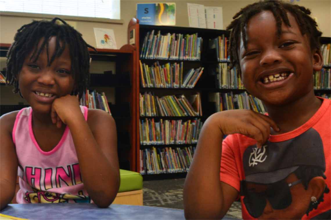 little boy and girl at the library
