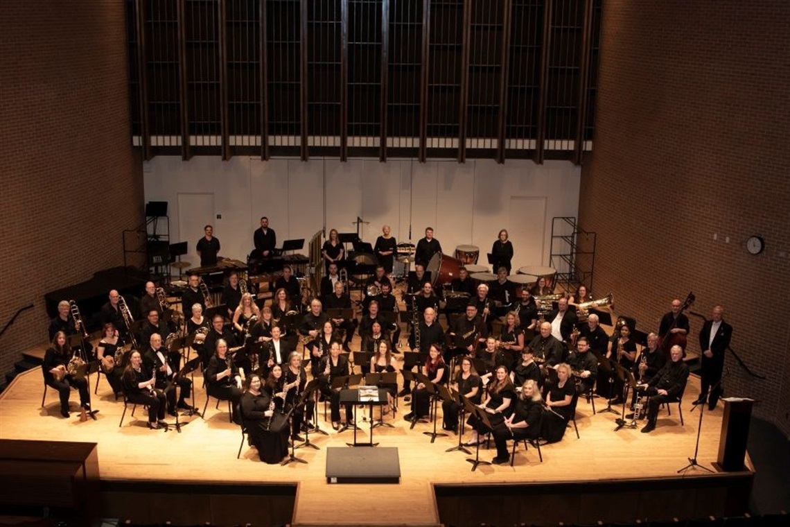 Arlington Community band on a stage