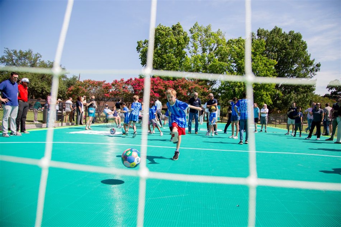 Children playing on the mini-pitch at George Stevens Park