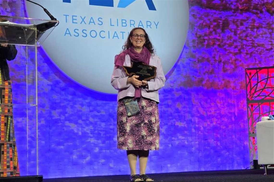Children's Librarian Dawn Reyes earns Texas Library Association's Distinguished Service Award in 2026.