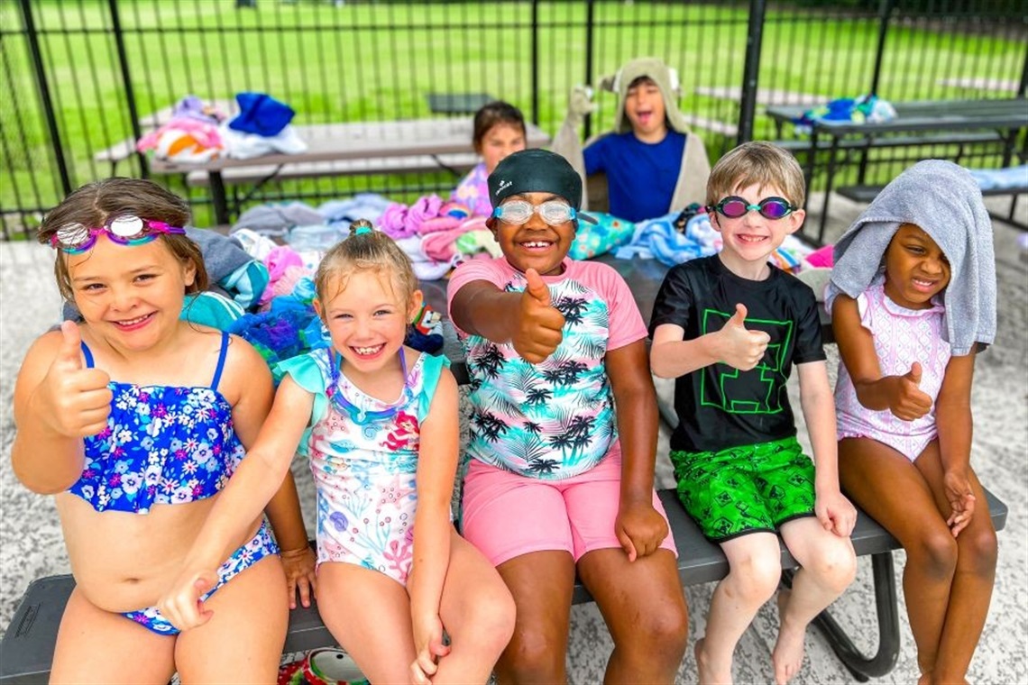 Group of kids in swimsuits