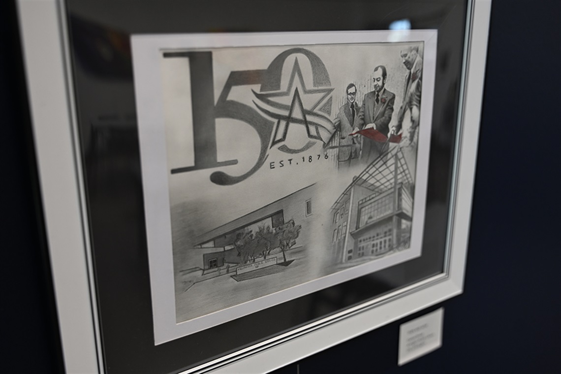 Pencil sketch artwork depicting the the City of Arlington's 150th logo, former Mayor Tom Vandergriff and other former city dignitaries, the former Downtown Library and current George W. Hawkes Downtown Library. 