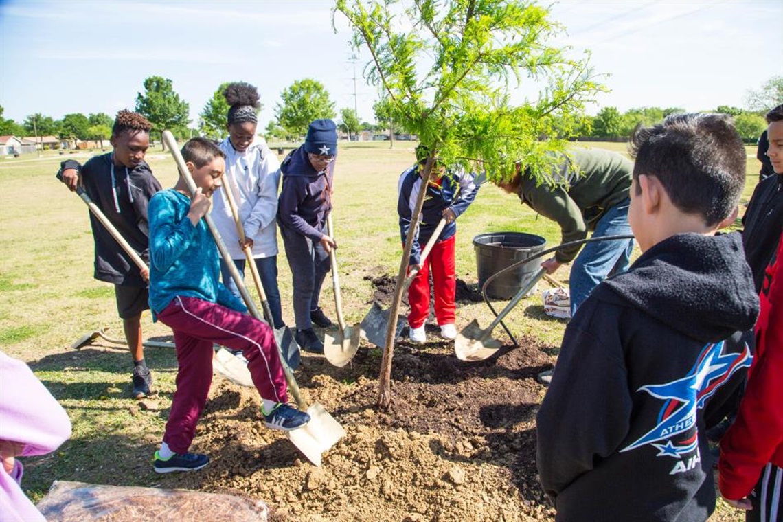 Children at tree planting event.
