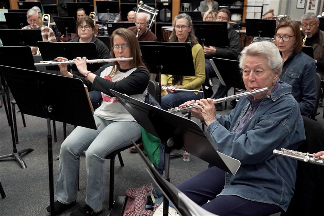 People playing flute instruments