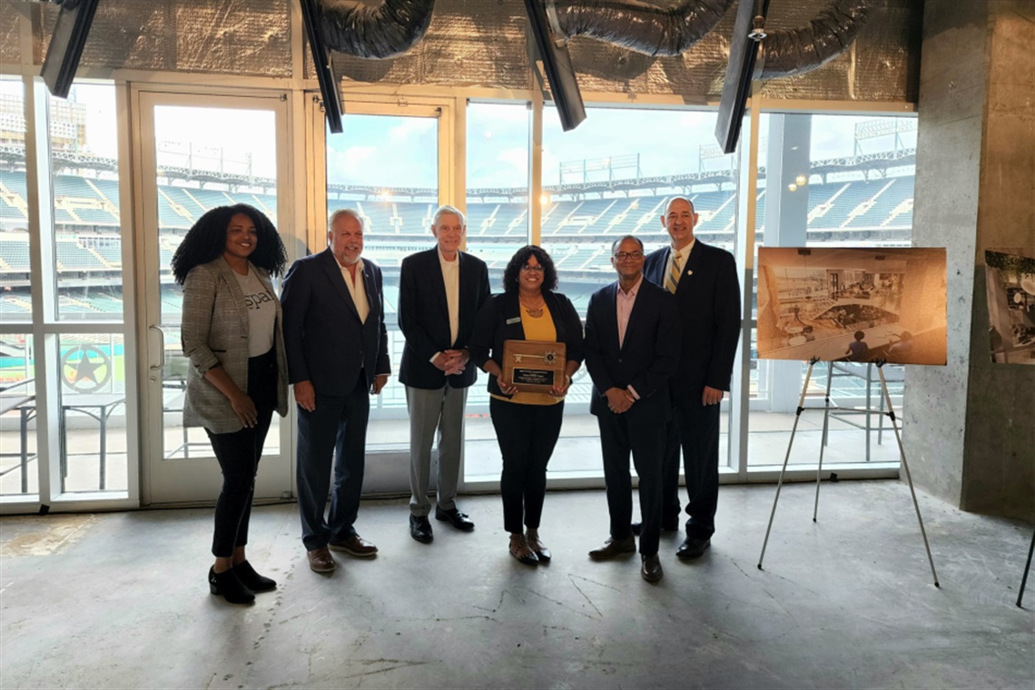 Group of people take photo at Spark Coworking construction