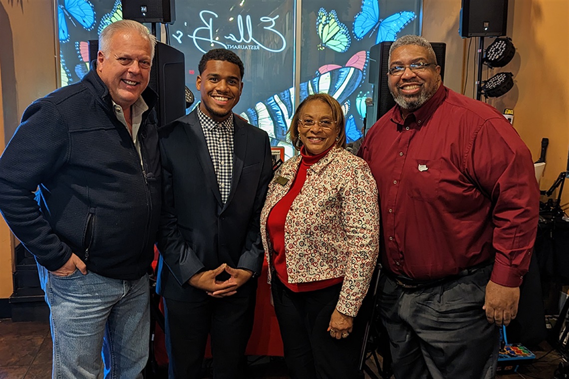 Mayor Jim Ross, Councilmember Dr. Barbara Odom Wesley, MWBE Staff member and Charles Jackson pose for photo at the Arlington Black Chamber of Commerce DFW Military and Veterans Brunch