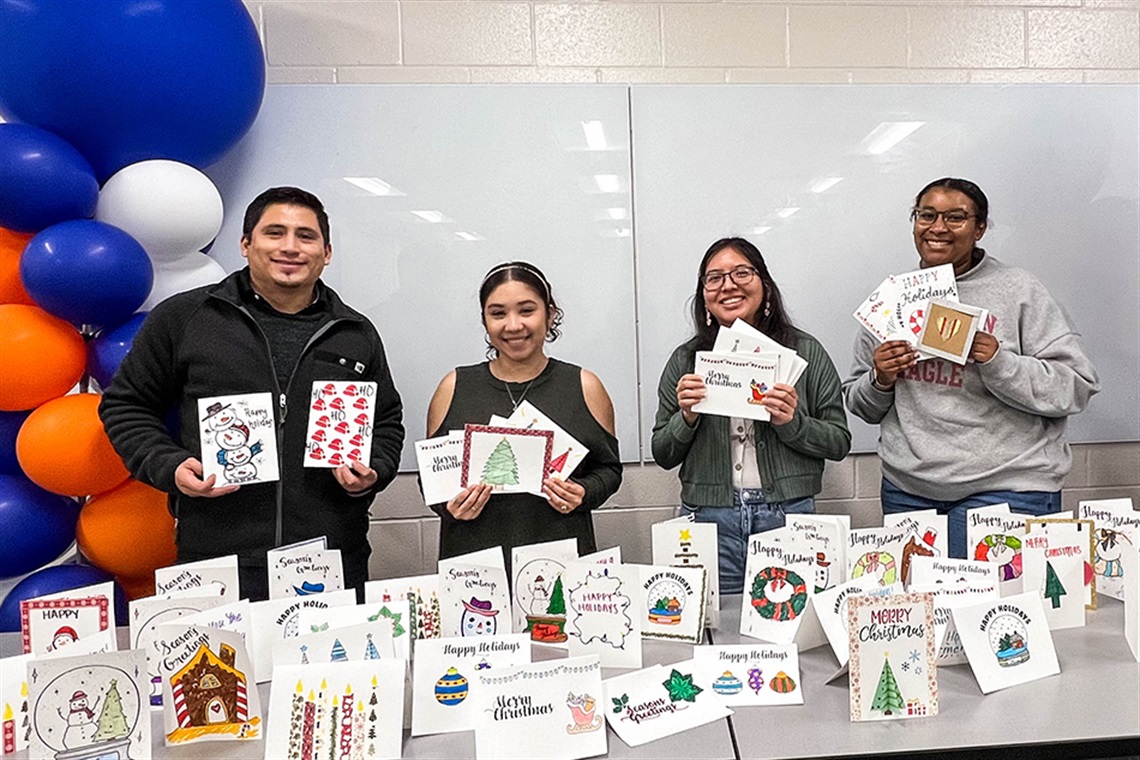 Students from UTA making holiday greetings cards for DFW area senior living facilities and nursing homes
