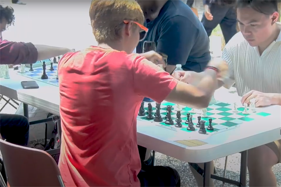 Students playing chess