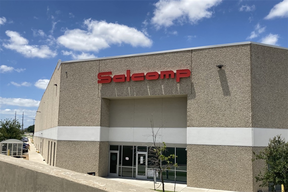 Photo of the exterior of Salcomp's facility in Arlington
