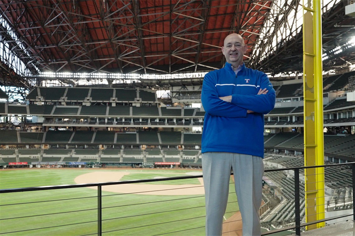Rob Matwick stands in front of foul pole inside Globe Life Field.