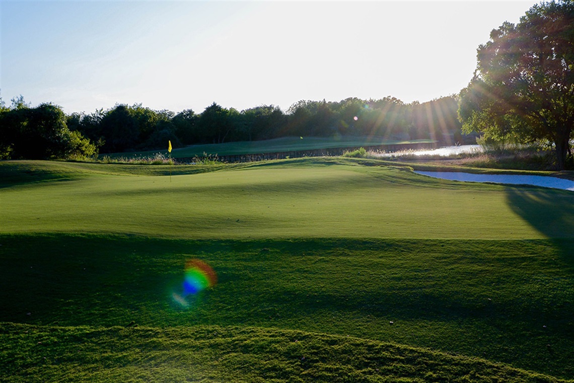Beautiful green with pin location near and bunker at Tierra Verde Golf Club 