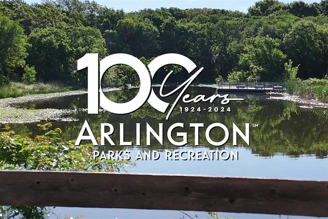 Arlington Parks Centennial Logo in the foreground with the Sheri Capehart Nature Preserve in the background