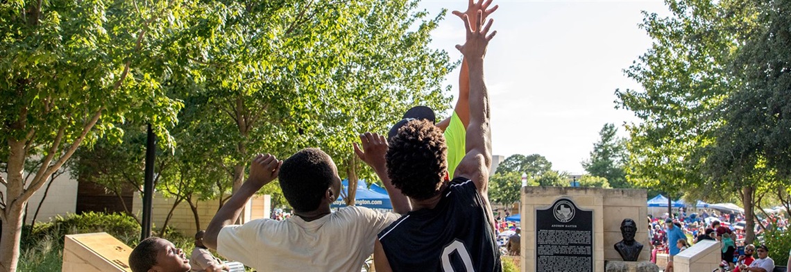 Group of kids looking up at sky